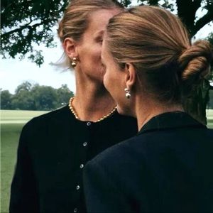 Dangling ball drop silver earrings